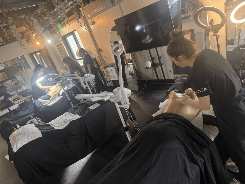 Students learning skincare analysis and consultation techniques